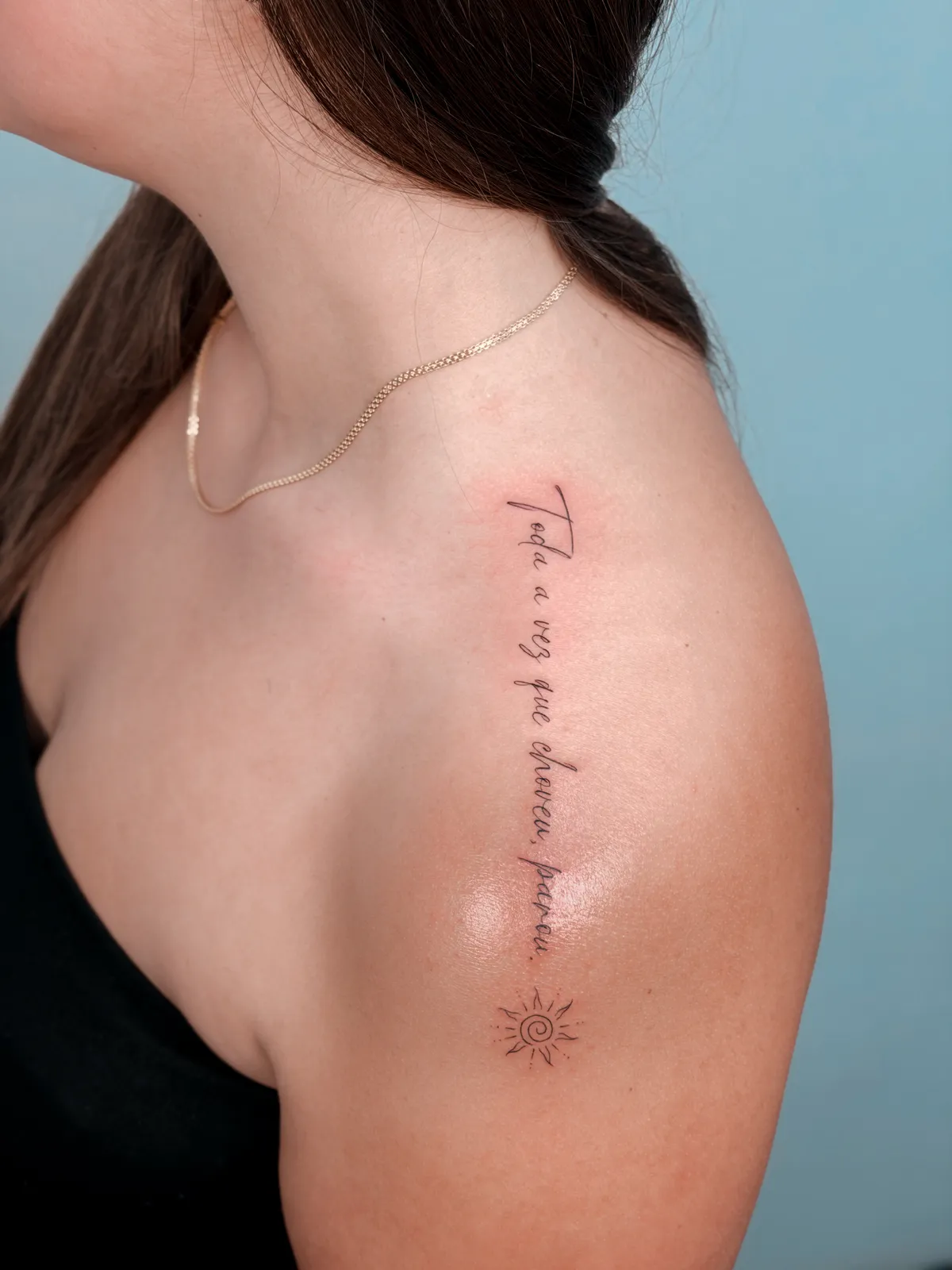 Handwritten shoulder lettering tattoo by Hugo Gonzalez