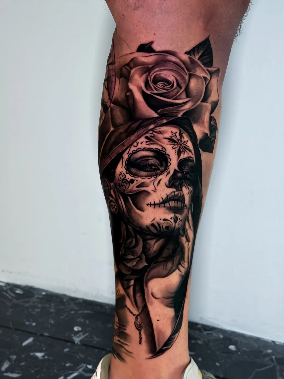 Catrina and rose black and grey realism tattoo by Hugo Gonzalez