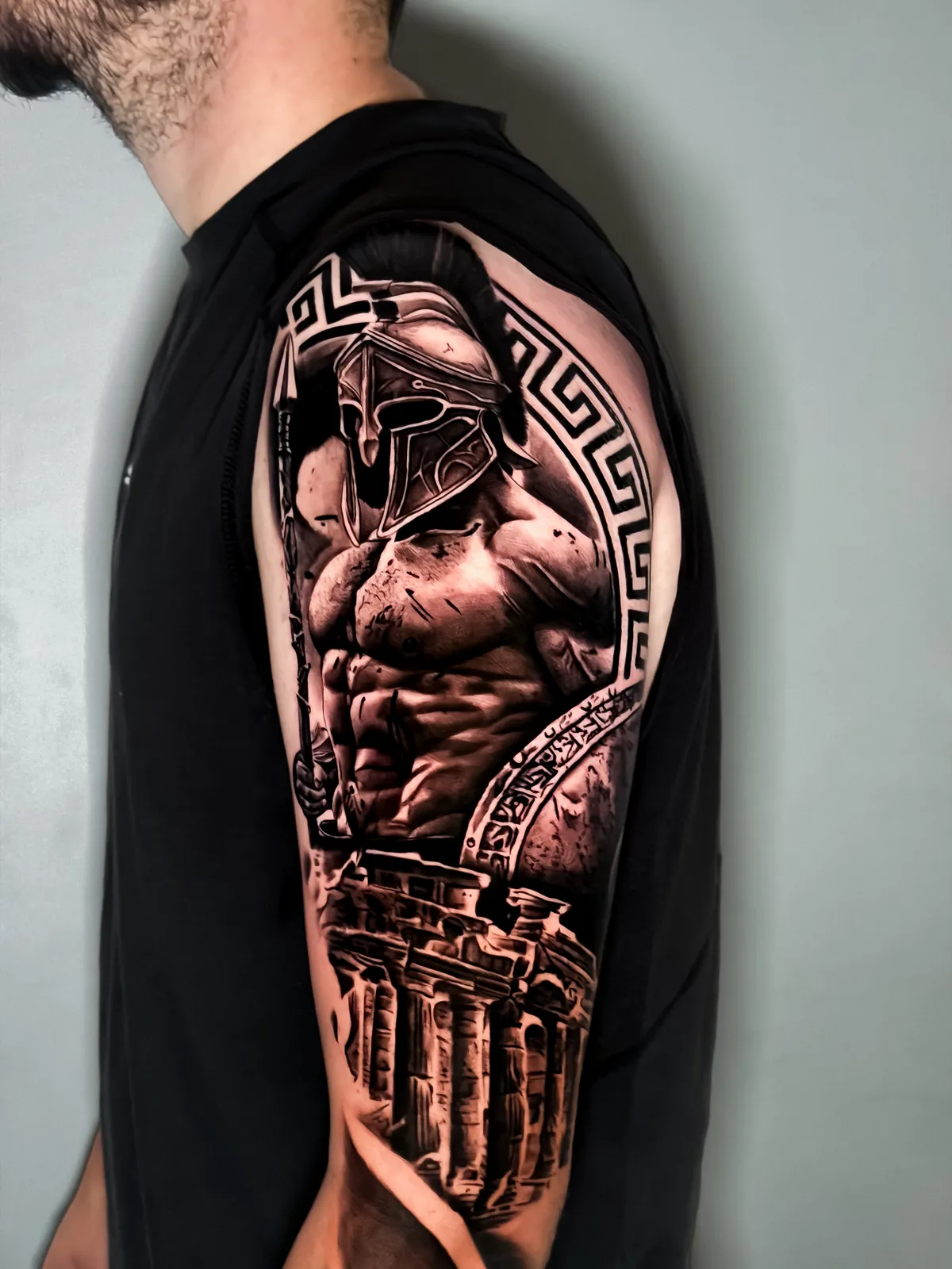 Spartan warrior with Greek columns tattoo by Hugo Gonzalez